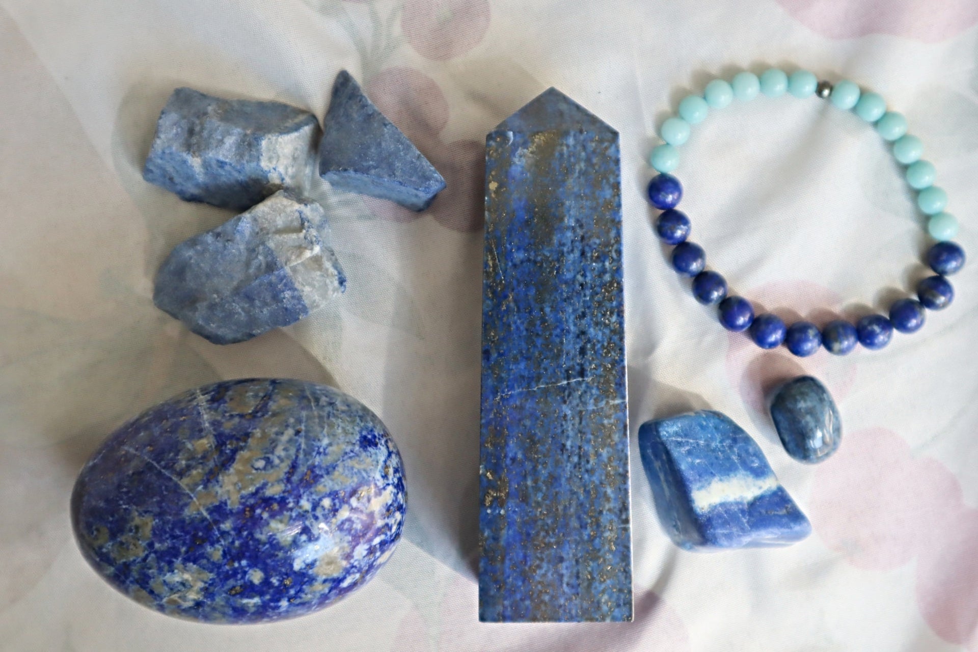 Lapis raw stones, towers, spheres, bracelets and jewelry