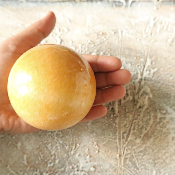 Orange Calcite Sphere 2.75 inch 489 grams 70mm 17.25 oz