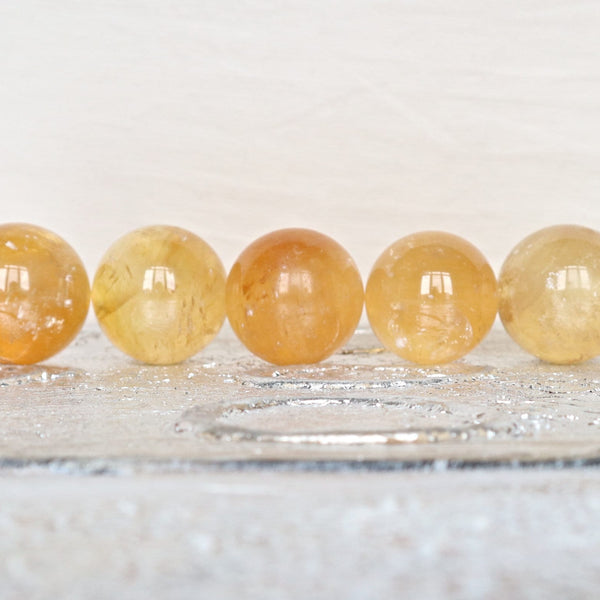 AAA Honey Calcite Sphere: Polished Yellow-Orange Crystal (38mm)