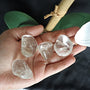 Himalayan Quartz Palm Stone: High Vibration Wealth Crystal