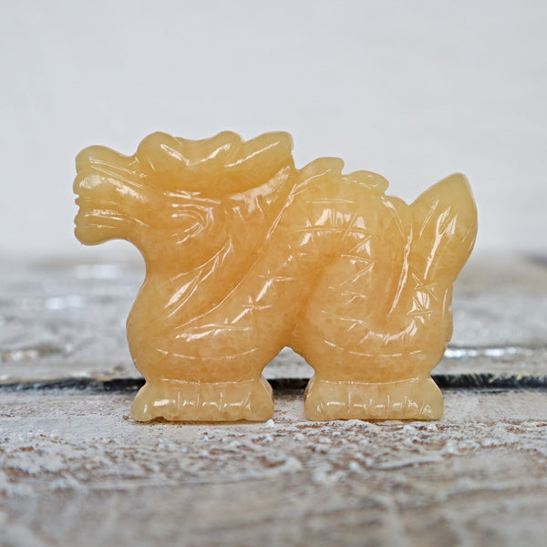 Hand Carved Orange Calcite Dragon: Feng Shui Home Decor