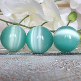 Green Cat's Eye Quartz Sphere: 40mm Crystal Healing Ball