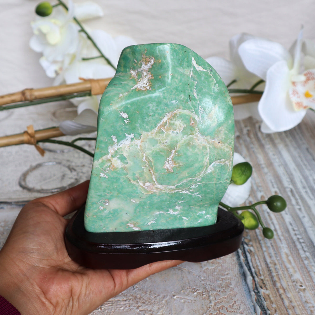 Large Nephrite Jade Stone free form on wooden stand for Abundance Lucky Stone