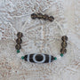 2 Eyed Dzi Bead Bracelet: Tibetan Agate, Malachite, Quartz