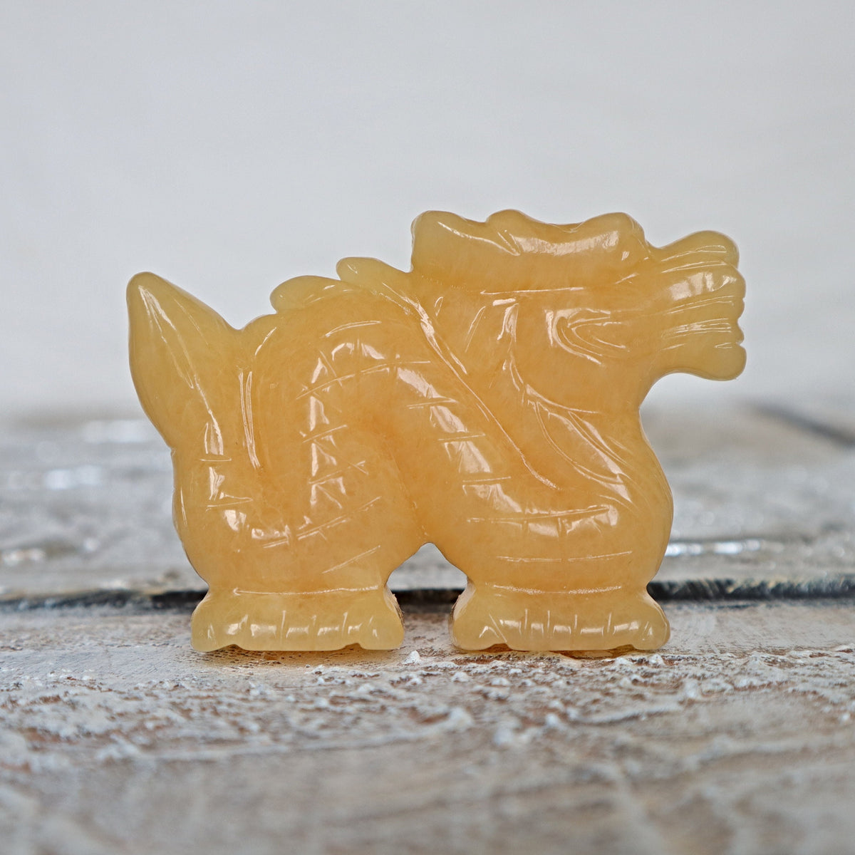 Hand Carved Orange Calcite Dragon: Feng Shui Home Decor