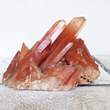 Large red hematoid quartz cluster