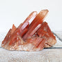 Large red hematoid quartz cluster