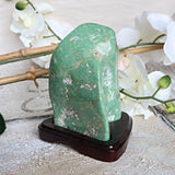 Large Nephrite Jade Stone free form on wooden stand for Abundance Lucky Stone