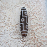 Himalayan dzi bead