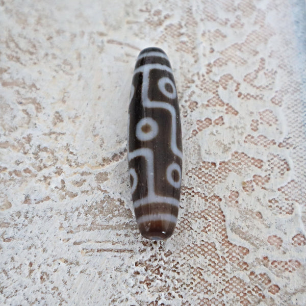 Himalayan dzi bead