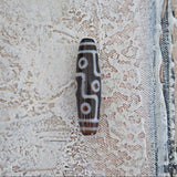 Buddhist protection bead