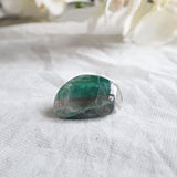 Tumbled fluorite for grounding and focus