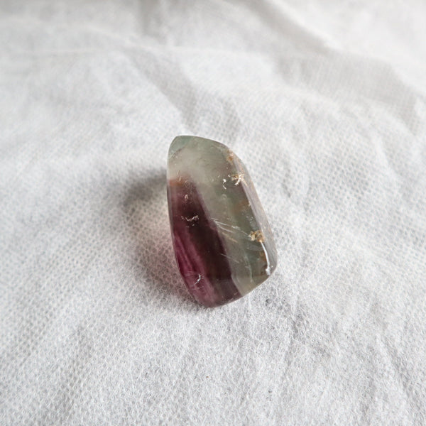 Natural fluorite pocket stone with calming energy