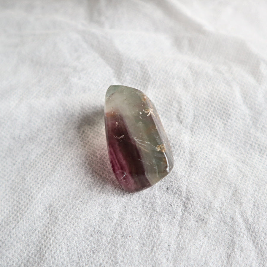 Natural fluorite pocket stone with calming energy