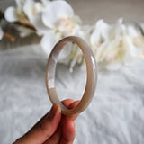 Polished agate bracelet for emotional grounding