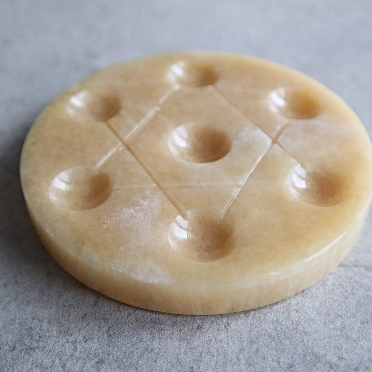 orange calcite crystal grid plate