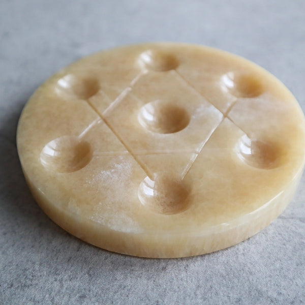 orange calcite crystal grid plate