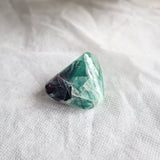 Natural fluorite pocket stone with calming energy