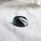 Natural fluorite pocket stone with calming energy
