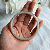 Natural agate bangle showing layered patterns