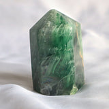 fluorite towers with feather inclusion in center