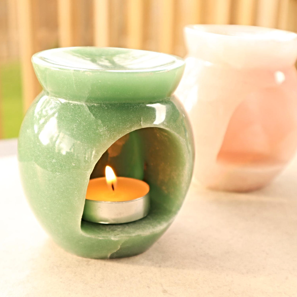 Handcrafted aventurine crystal lamp used as an aromatherapy diffuser