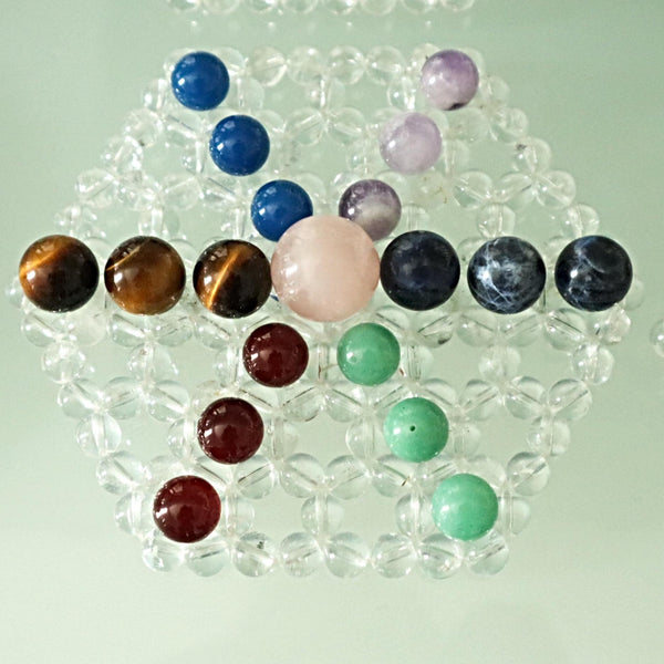Handmade crystal grid featuring natural stones for healing and manifestation