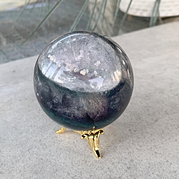 Lodolite crystal ball close-up with scenic patterns