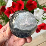 Garden quartz sphere with moss-like inclusions