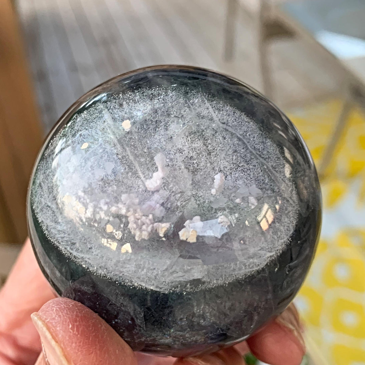 Dreamy inclusions inside garden quartz sphere