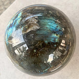 Labradorite crystal ball radiating energy in 360 degrees