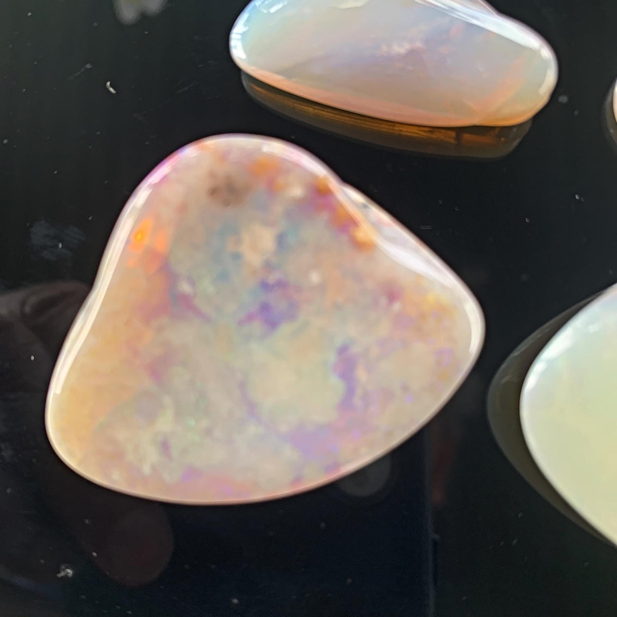 Rare Australian fossil opal with play of color
