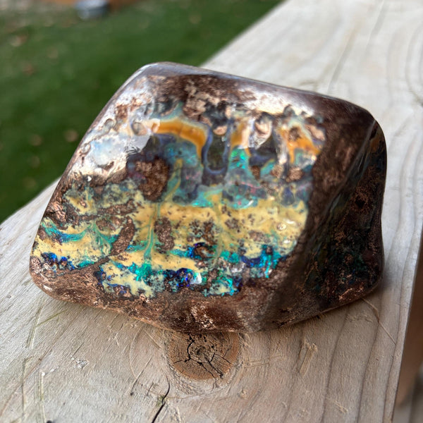 Raw boulder opal with natural color play