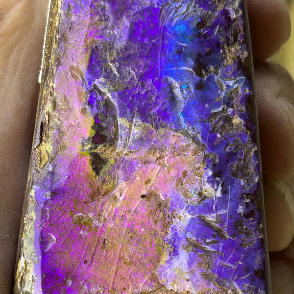 Natural opal crystal with deep blue hues