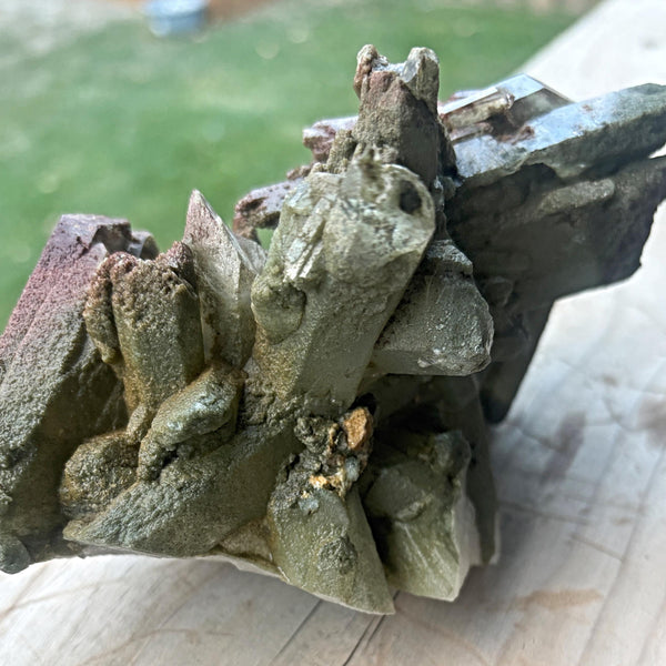 quartz cluster with iron oxide inclusions