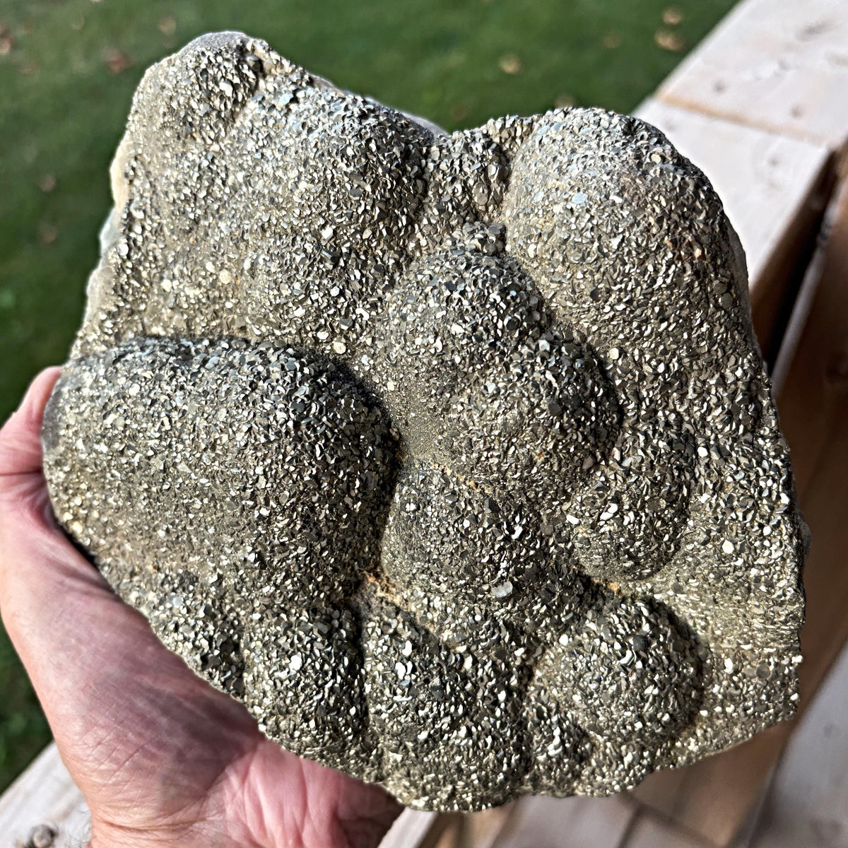 Large botryoidal fluorite covered with pyrite crystals