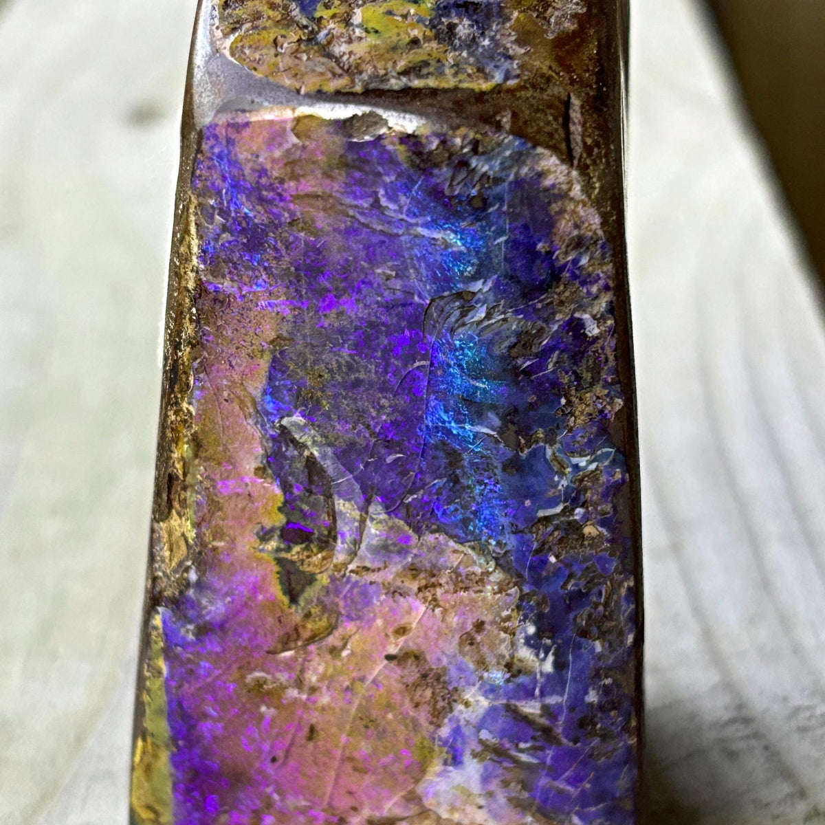 Rare purple pink boulder opal specimen