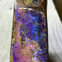 Rare purple pink boulder opal specimen