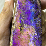 Rare purple pink boulder opal specimen