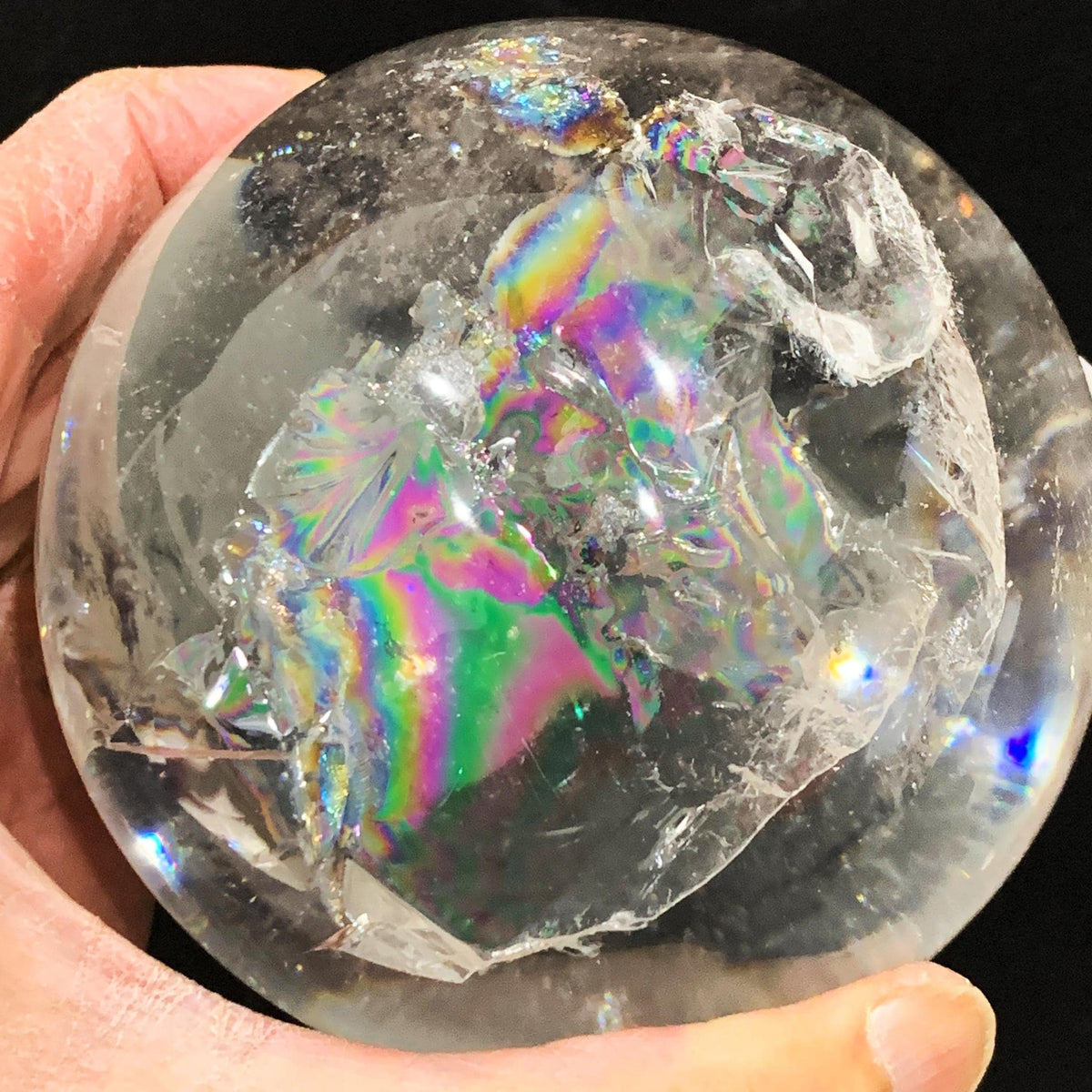 Rainbow Flashes in large Clear Quartz Sphere