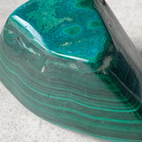 Polished malachite banded stone