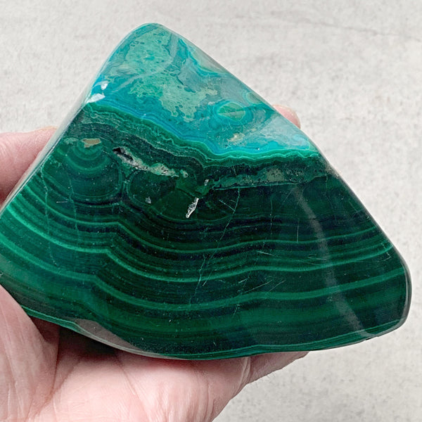Polished malachite banded stone