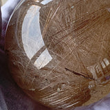 Natural rutile quartz sphere
