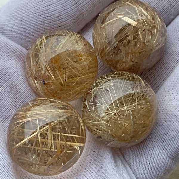 golden rutilated quartz sphere