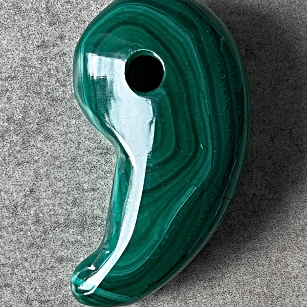 malachite magatama carving