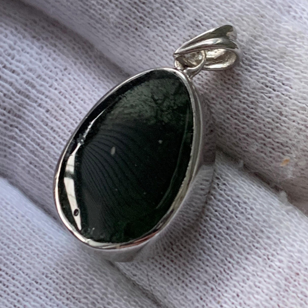 Polished moldavite cabochon teardrop crystal pendant