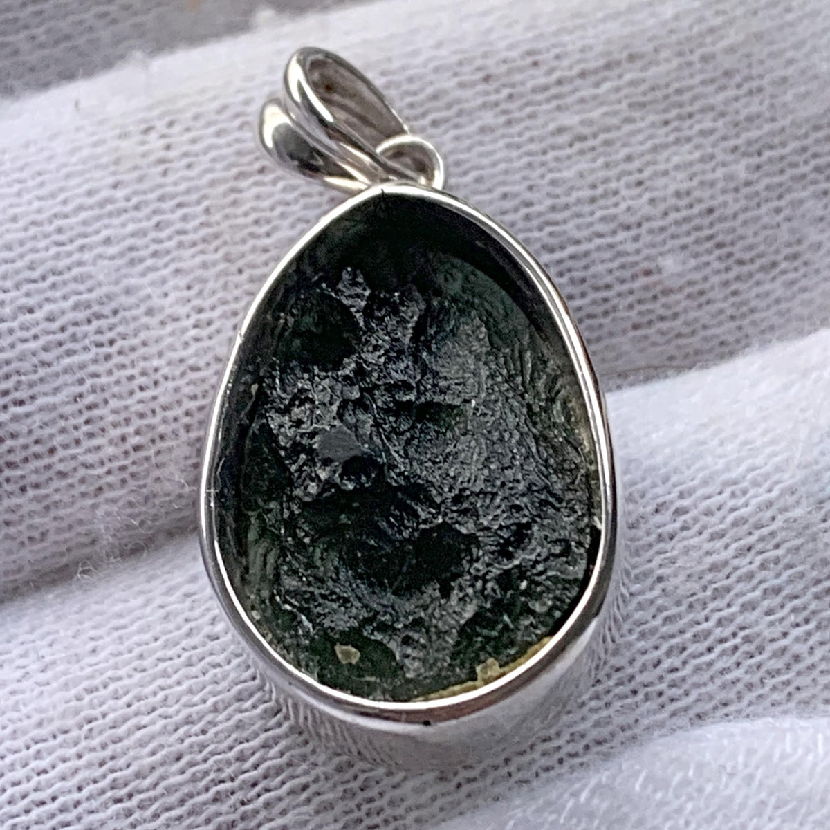 Authentic Czech moldavite pendant close up
