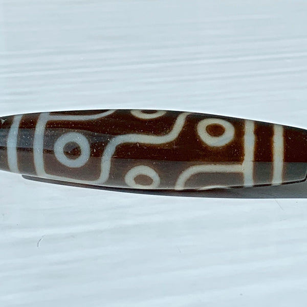 Tibetan amulet bead 9 eye dzi bead