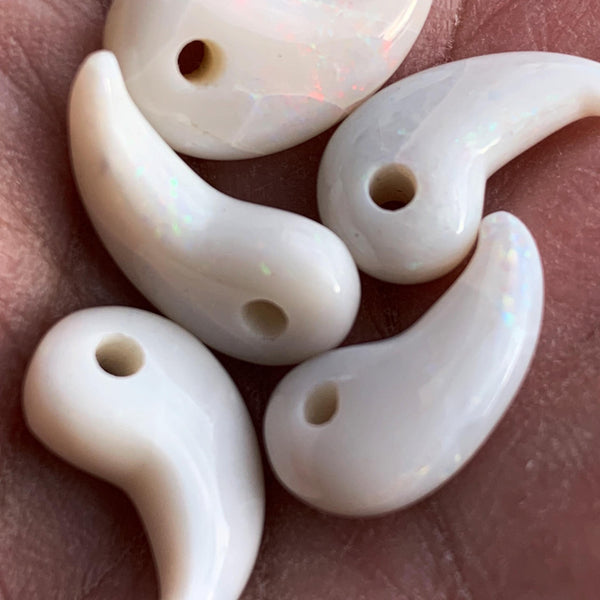 Ancient style magatama carved from natural opal