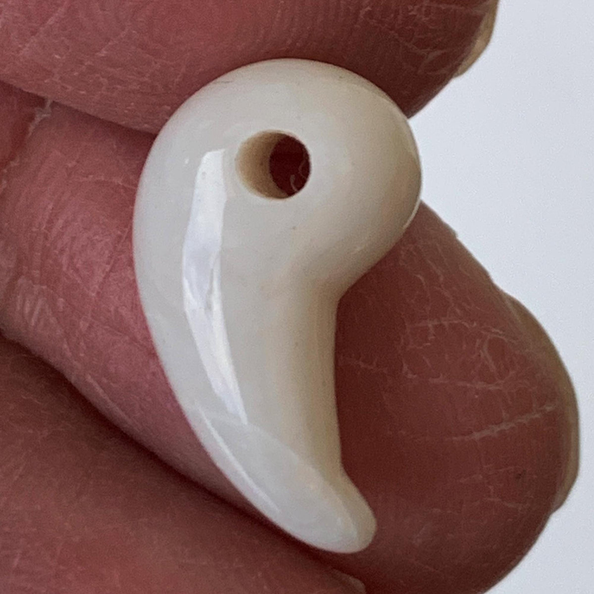 Australian opal magatama carved in traditional shape